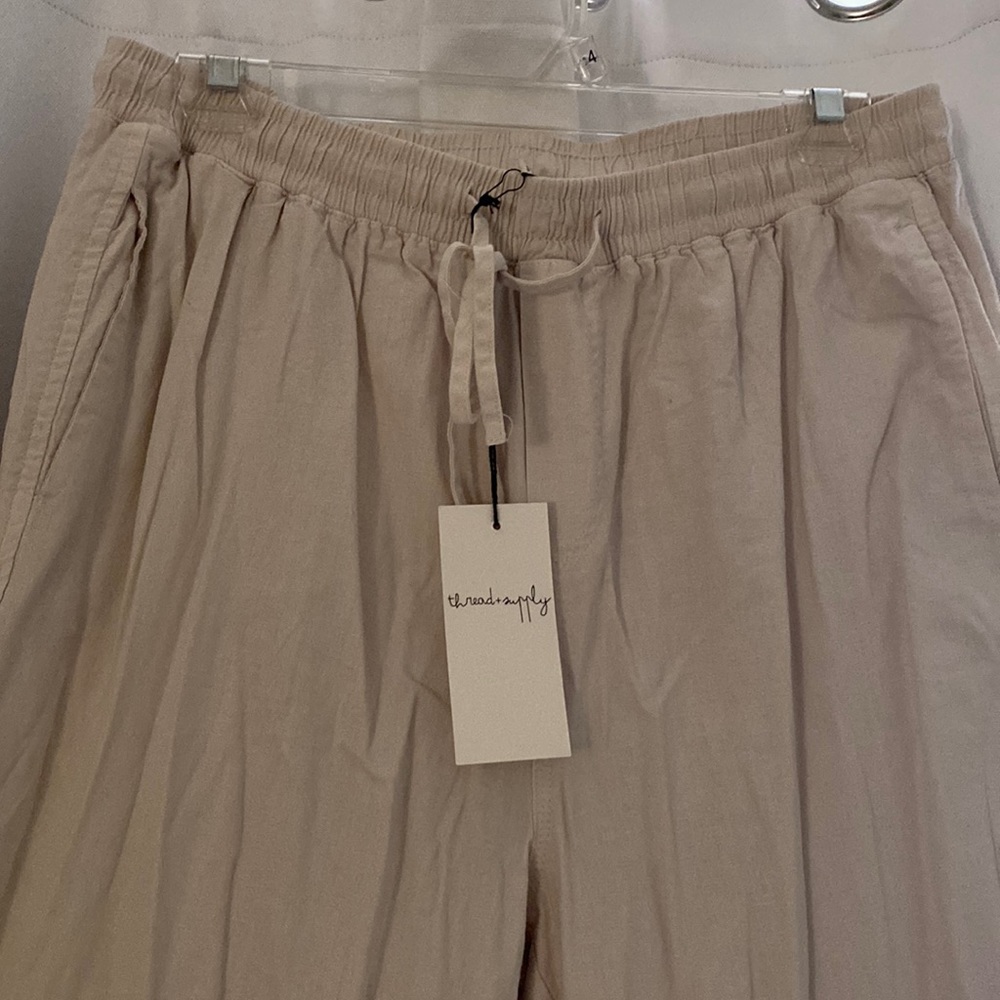 Cream joggers, size L, never worn
